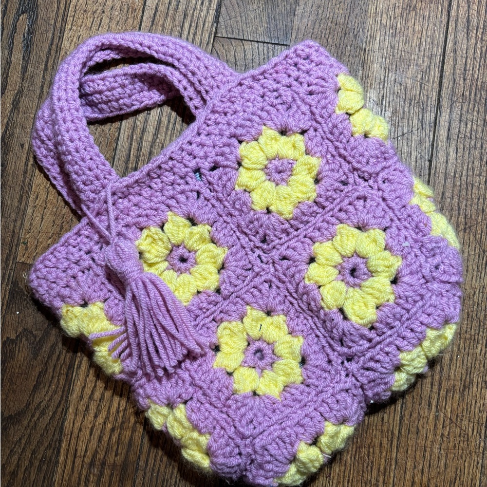 Lavender Crochet Handbag with Granny Square Pattern and Yellow Flower Motifs